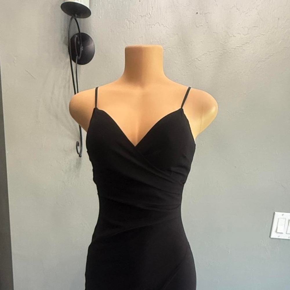 Black maxi dress with adjustable straps‎ and slit